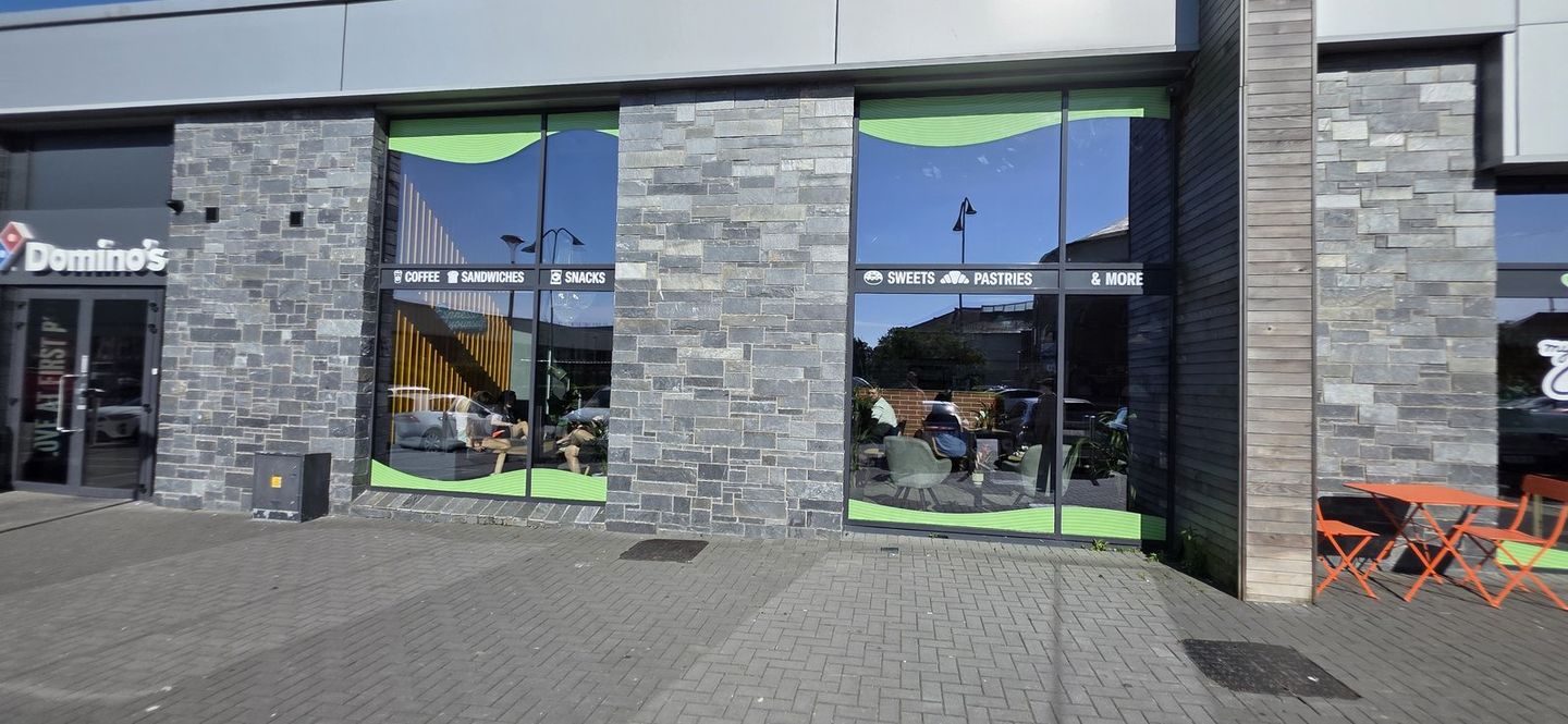 Domino's storefront window graphics by Shop Front Makers